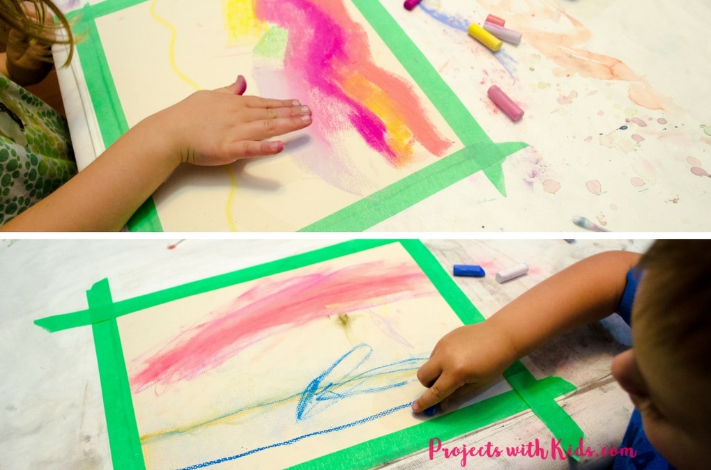 Create these stunning chalk pastel sunsets with kids. So much messy fun, kids will love learning and exploring with chalk pastels! 