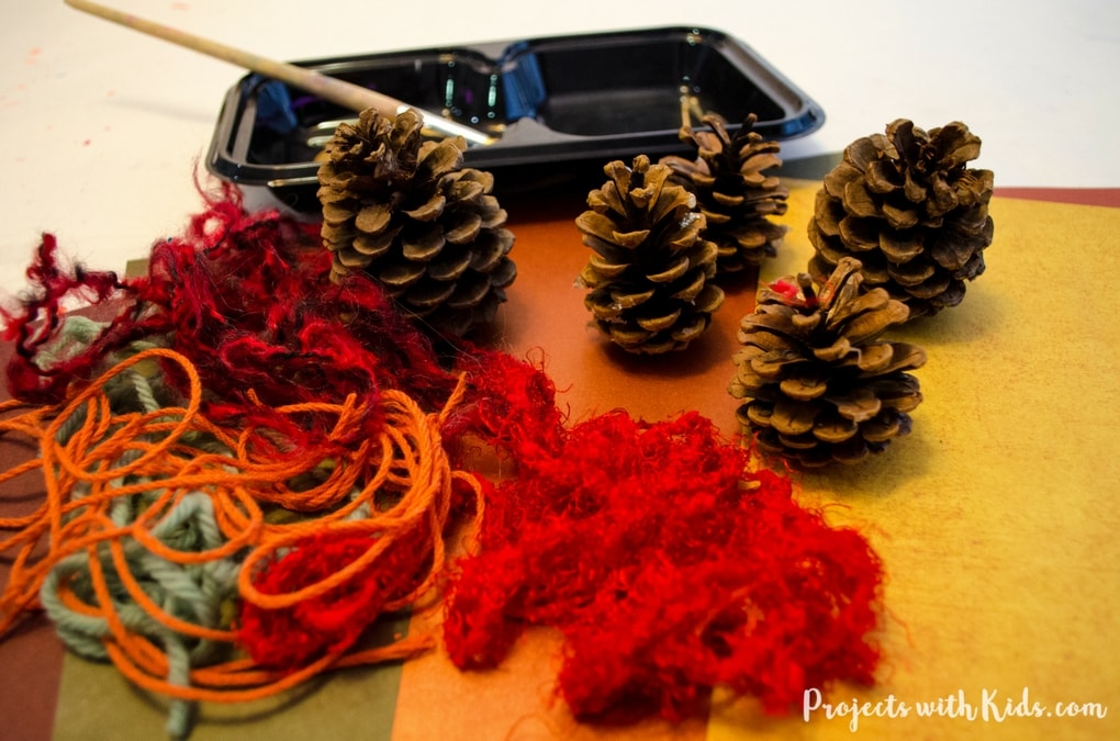 Bring some natural elements to your holiday decor this year with these beautiful pinecone place card holders. This is a simple craft that kids of all ages will be able to do and will have fun making! A perfect decoration for your holiday table that can be used year after year. 