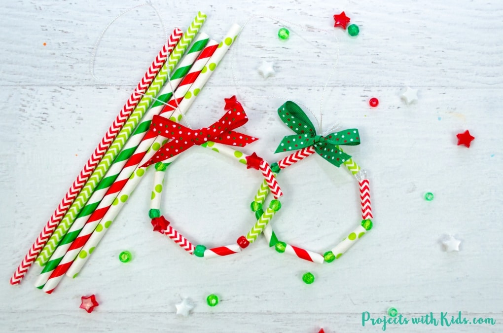 Best Christmas Paper Crafts featured by top Seattle lifestyle blogger, Marcie in Mommyland: These wreath ornaments with paper straws are the perfect colorful addition to any Christmas tree. An easy and fun Christmas craft for kids of all ages. 