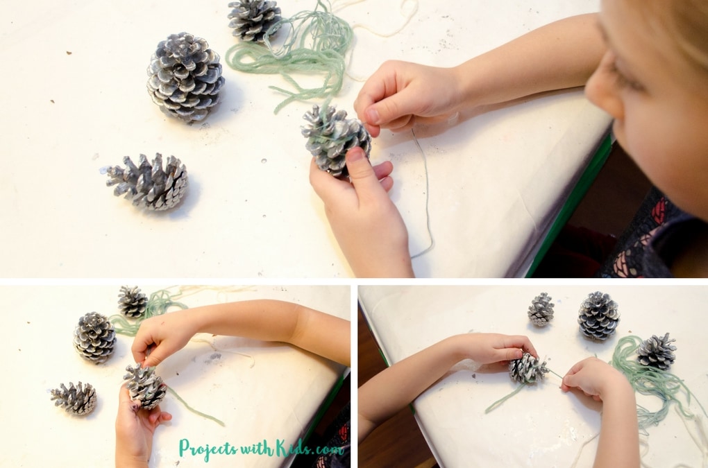These pinecone ornaments are so simple and beautiful! A perfect Christmas craft for kids of all ages. An elegant addition to any Christmas tree and a great handmade gift for someone special. 