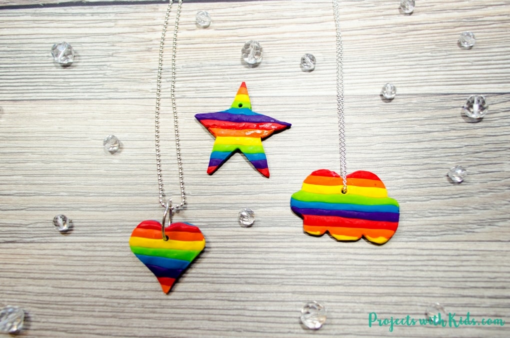 Learn how to easily make beautiful rainbow jewelry for kids using polymer clay. Kids will have fun making these unique charms in all sorts of fun shapes. A great handmade gift for kids to give to their friends!