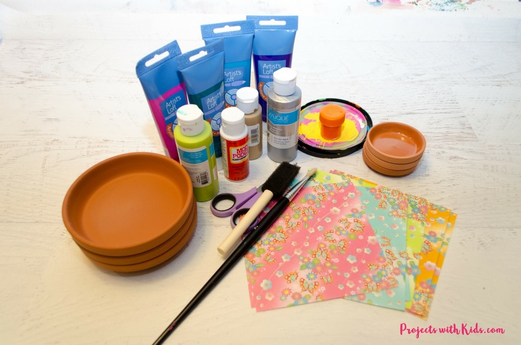 These kid made jewelry dishes make the perfect Mother's Day craft or handmade gift for any occasion. Bright and colorful and super easy to make, kids will love making their mom's this special gift.