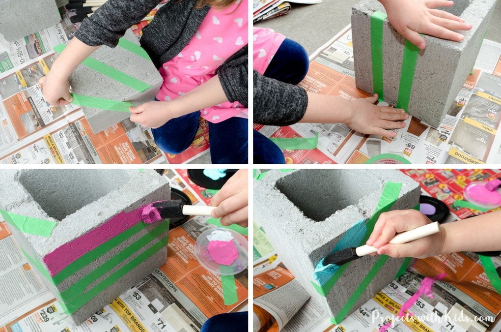 p-content/uploads/2018/03/painted-cinder-blocks-progress1-1.jpg"" alt="Add some wow factor to your patio or balcony with these fun & colorful painted cinder blocks. These DIY planters make such a fun garden project for kids and a great family outdoor activity for spring or summer.