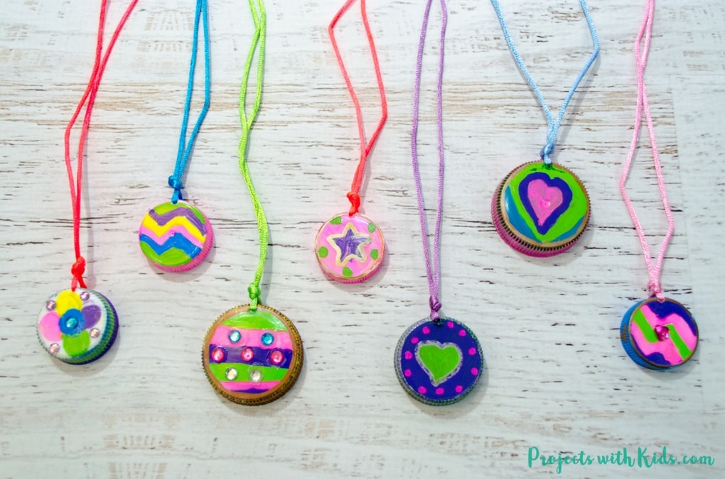 This upcycled necklace craft for kids could not be any easier to make! So fun and colorful, kids will want to make them for all their friends. They also make a great Earth Day project or Mothers Day craft. Kids can create their own unique designs for one of a kind jewelry that makes a wonderful handmade gift.