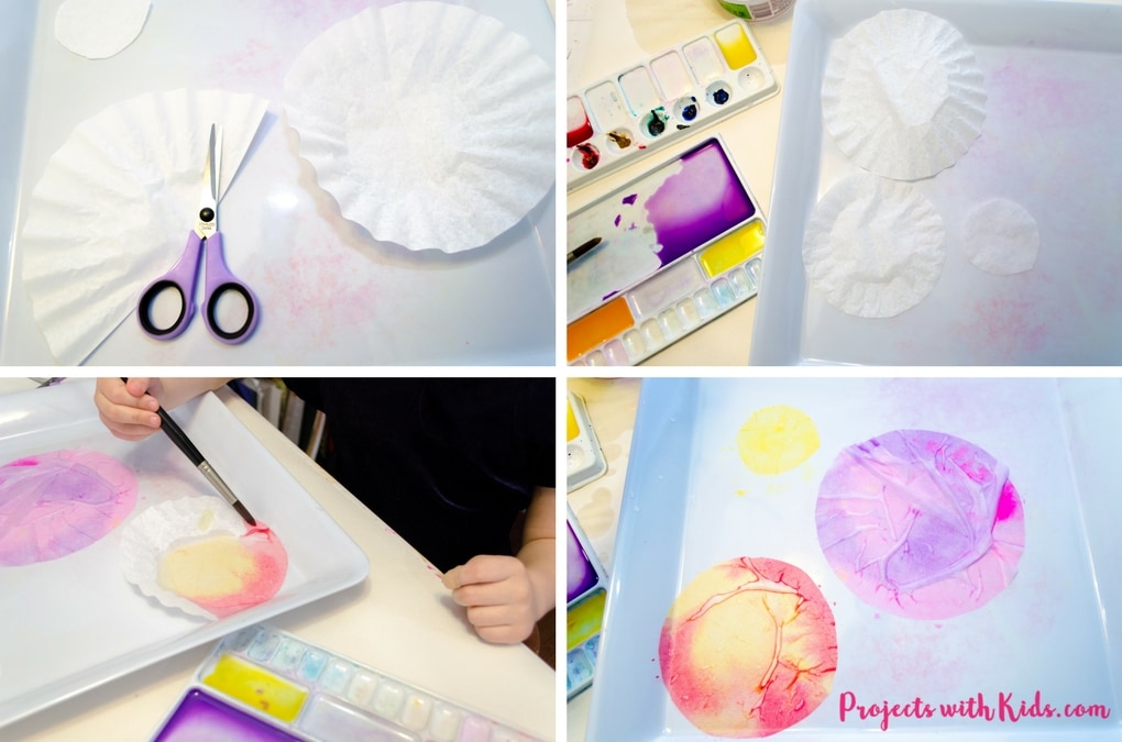 This 3D flower Mother's Day card craft is such a beautiful project for kids to make for their moms or grandmas for Mother's Day! Coffee filters and watercolor paint make a gorgeous 3D flower while the background is made with a unique and easy watercolor technique that kids will have fun creating. Kids will love making this gorgeous card for someone special.