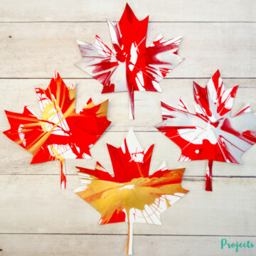 Kids of all ages will have tons of fun spin painting and making cool patterns with this Canada Day craft. An easy project for preschool kids to make on their own and an awesome process art project for kids of all ages! Click through to get your free maple leaf template.