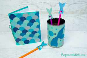 Kids will love making these adorable mermaid diy school supplies! Make a mermaid scales notebook, a mermaid pencil holder and adorable mermaid tail pencil toppers. A fun back to school craft. Free printable templates included.
