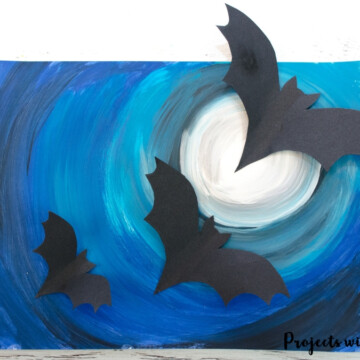 A full moon, spooky Halloween sky and flying bats come together to make this awesomely spooky Halloween art project that kids will love to create! Free bat templates included.