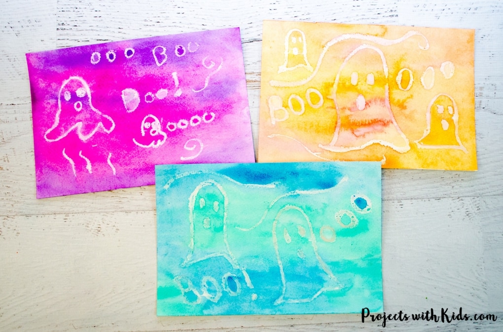 Kids will love watching their ghost pictures appear with this easy watercolor resist technique. A fun non-scary Halloween craft for kids.