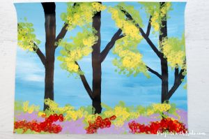 This gorgeous spring trees painting is so fun to make! Using bundled q-tips makes this an easy art project for kids of all ages. Free printable trees template included.