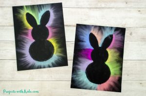 This bunny art project is adorable and so fun for kids to make! Kids will love using this easy chalk pastel technique to create this brightly colored Easter craft. Free bunny template included.