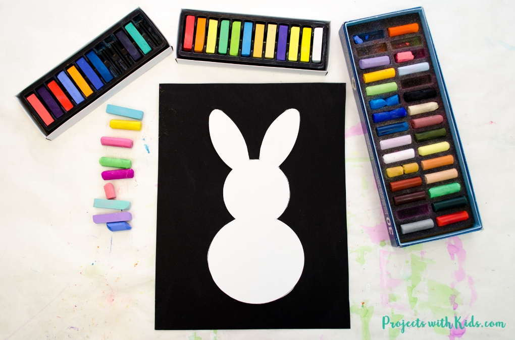 This bunny art project is adorable and so fun for kids to make! Kids will love using this easy chalk pastel technique to create this brightly colored Easter craft. Free bunny template included. 
