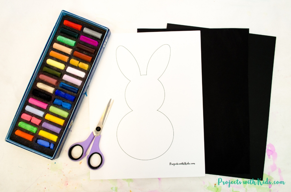 This bunny art project is adorable and so fun for kids to make! Kids will love using this easy chalk pastel technique to create this brightly colored Easter craft. Free bunny template included. 