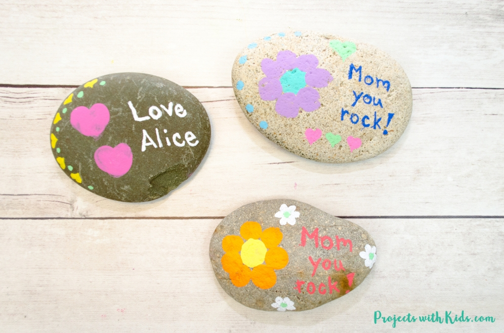 painted rock craft using fingerprint art 