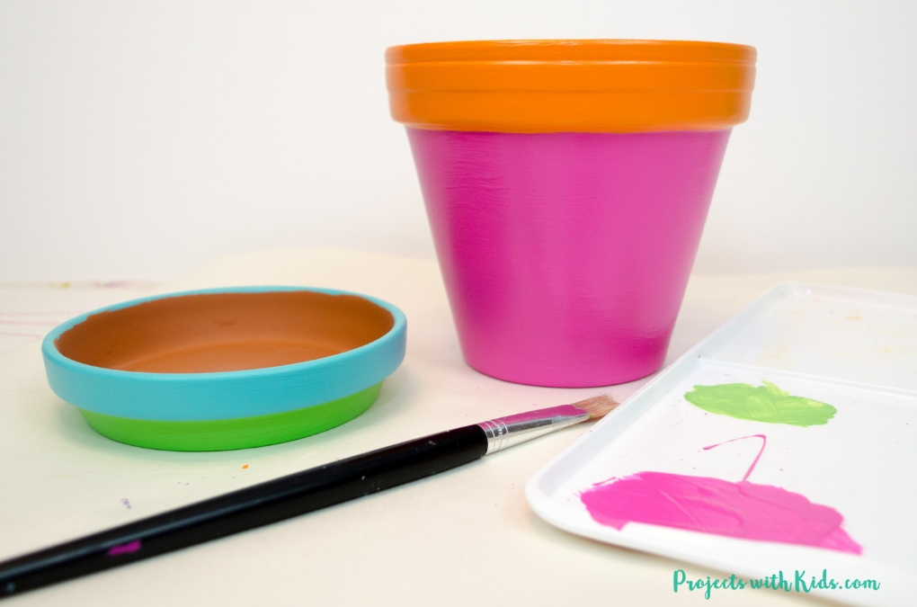 These bright and cheerful plant pots are so fun and easy for kids to make! Adding in a plant pun makes them extra fun!