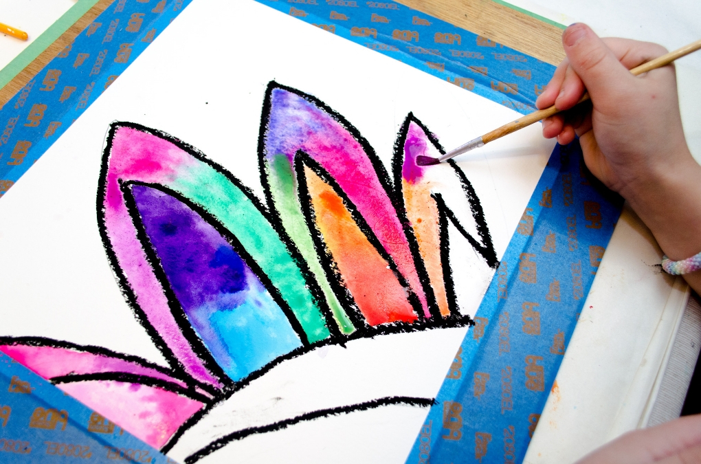 Kids will love creating this gorgeous watercolor flower painting! Use easy watercolor techniques to make this colorful art project that is perfect for spring or summer. 