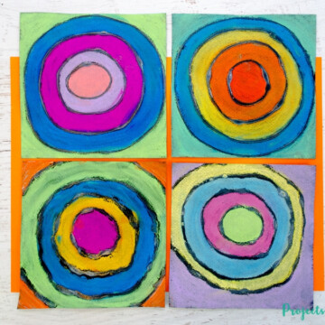 Kandinsky inspired circle art made with chalk pastels and glue.