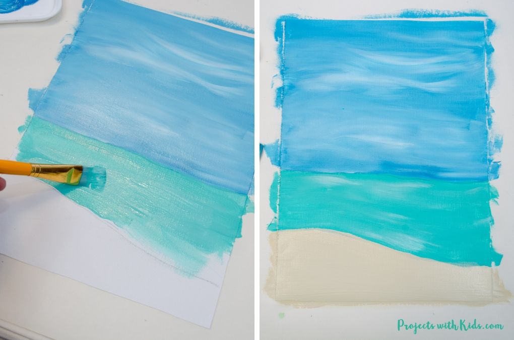 Painting in the water and sand with acrylic paint onto canvas.