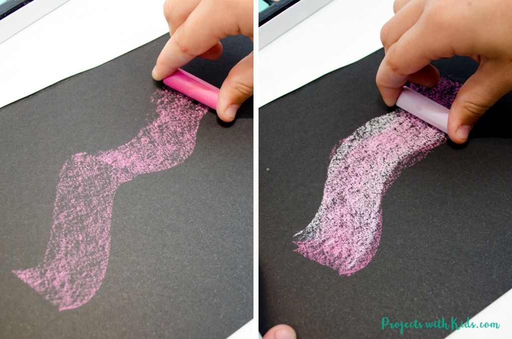 Using 2 shades of pink to layer pastel colors on black paper.