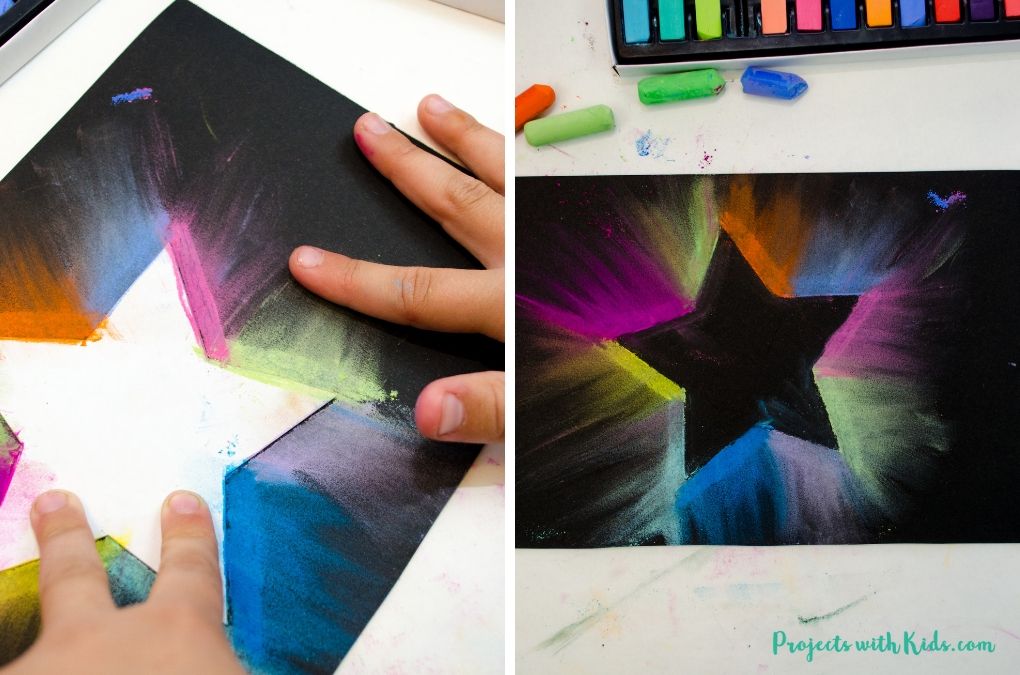 Making a chalk pastel star drawing.