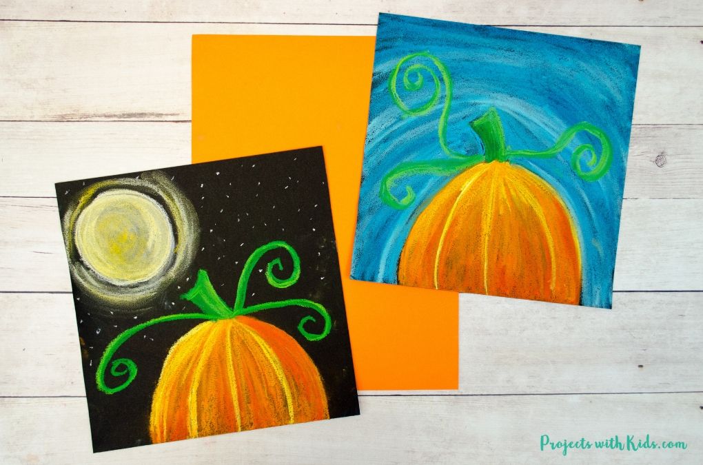 Pumpkin chalk pastel art - 2 ways. One pumpkin with a bright blue sky and one pumpkin with a full moon starry sky. 