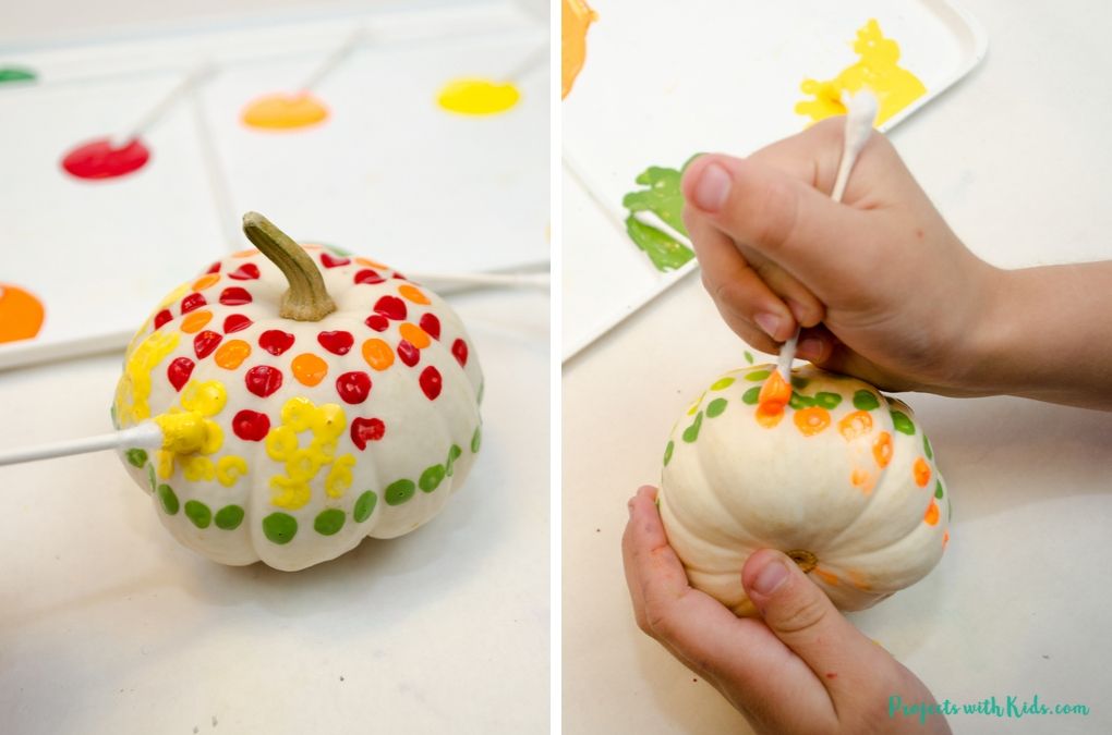 Painted mini white pumpkins using q-tips 