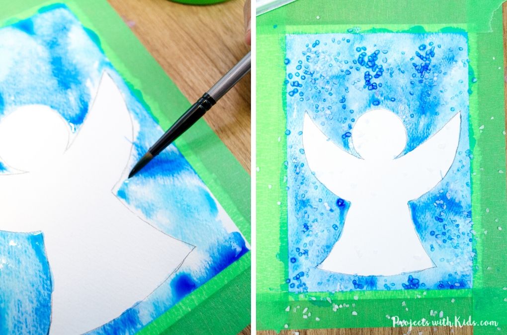 Painting an angel watercolor Christmas card and adding salt to the painting.