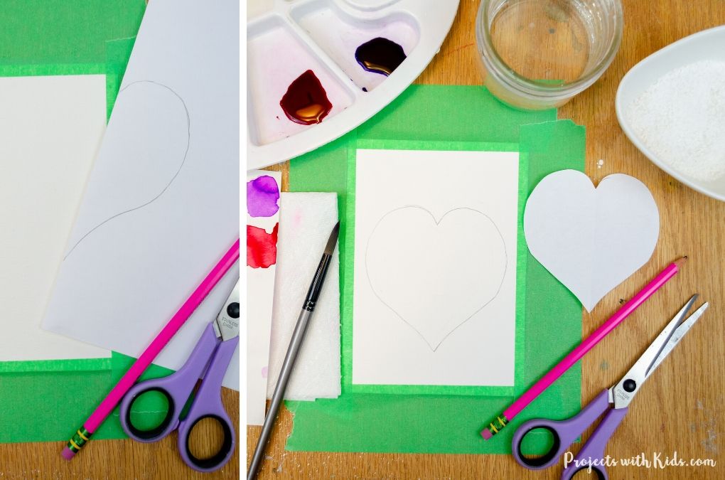 Drawing a heart template onto watercolor paper.