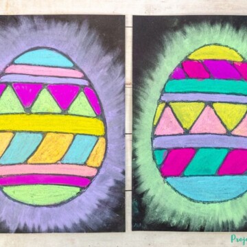 Chalk pastel easter egg art on black paper for kids to make.