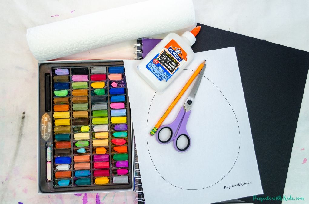 Chalk pastels, black paper, glue, scisors, pencil
