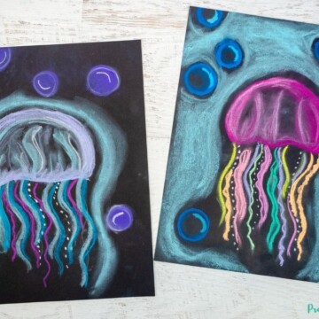 Jellyfish art project for kids to make using chalk pastel on black paper.