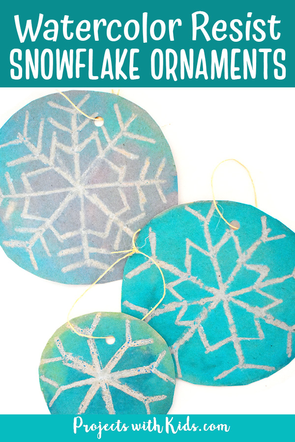 Watercolor resist DIY snowflake ornaments for kids to make