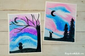 Watercolor winter silhouette art project for kids and tweens to make.