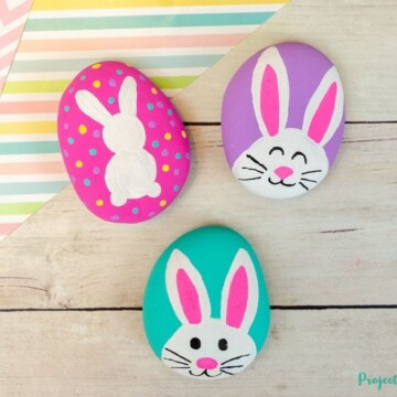 Bunny painted rocks spring or Easter craft idea for kids.