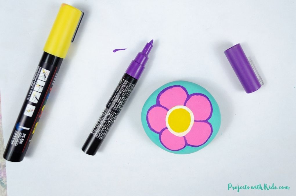Colorful flower painted rock for kids to make