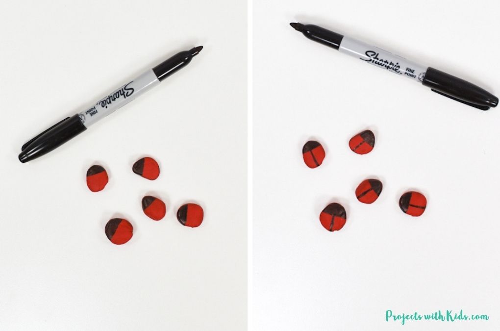using a sharpie to make ladybug painted rocks