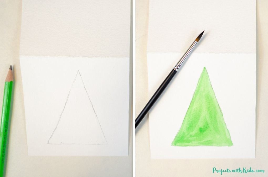 Drawing a triangle tree and painting it with green watercolor paint