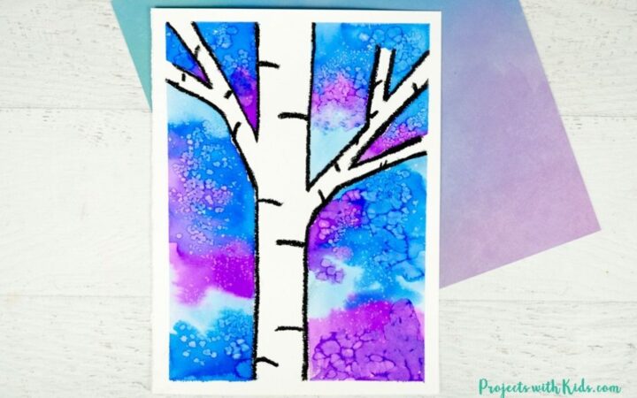 Watercolor winter birch tree painting idea for kids.