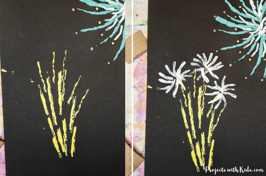 Firework painting for kids on black paper