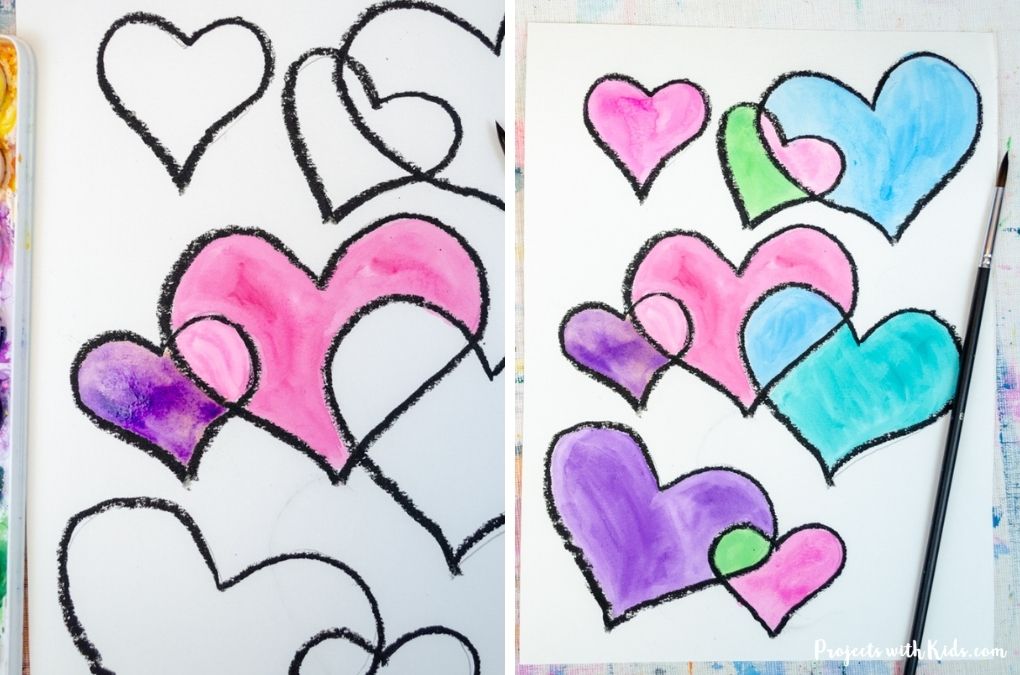 painting in hearts on watercolor paper