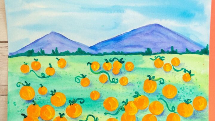 Pumpkin patch art project for kids: watercolor pumpkin painting.