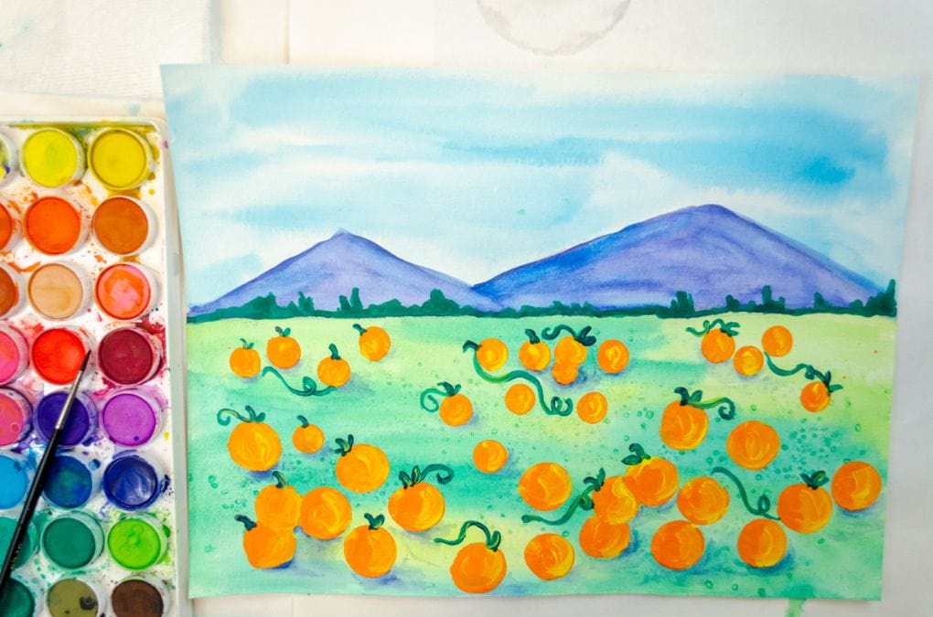 Step-by-step pumpkin patch art project using acrylic paints.