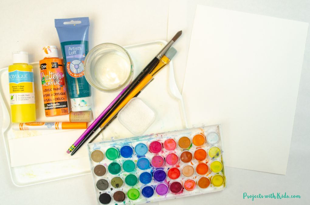 Painting supplies needed for a pumpkin patch kids art project.