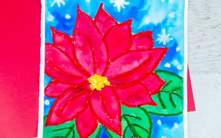 Poinsettia art project for kids to make using watercolor paint and oil pastels.