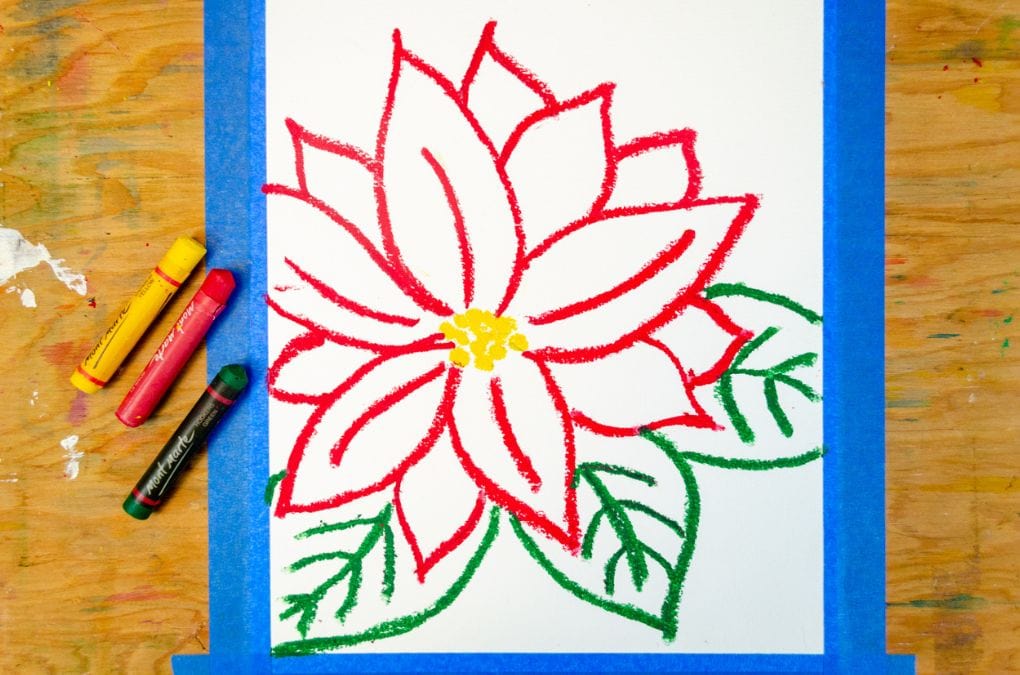 Drawing with chalk pastels on watercolor paper a poinsettia flower.
