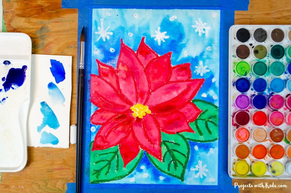 Poinsettia painting using watercolors and oil pastels, watercolor paint.