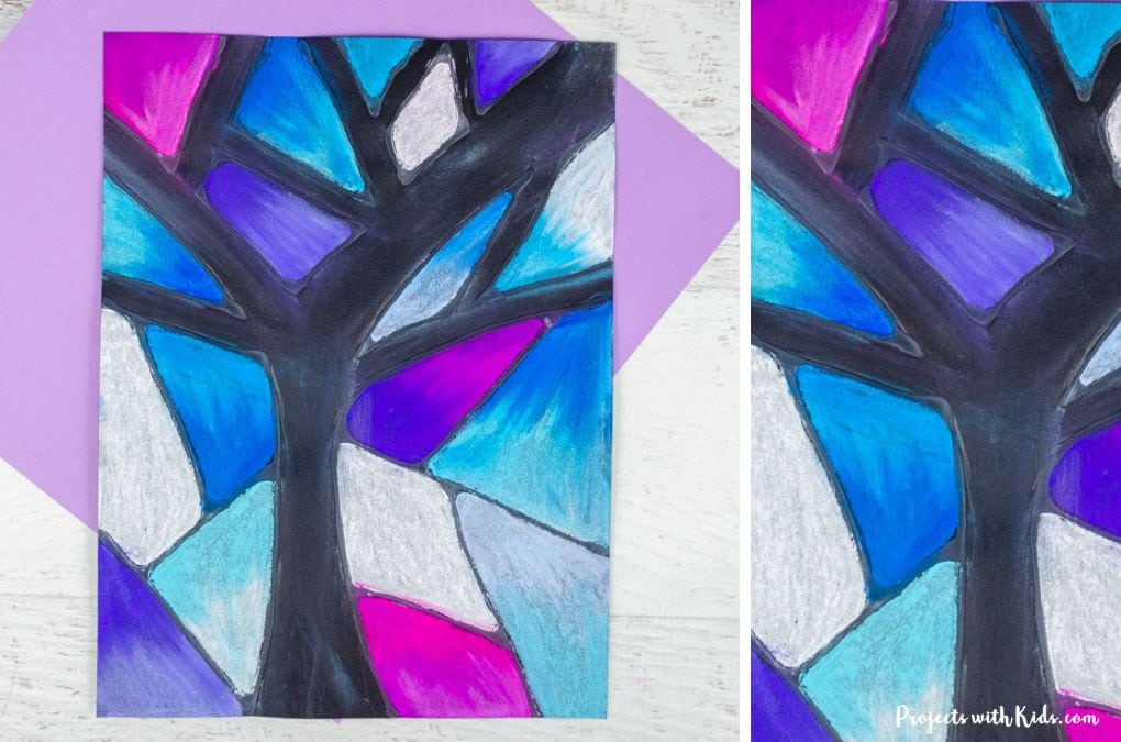 Winter art project for kids - chalk pastel winter tree on black paper.