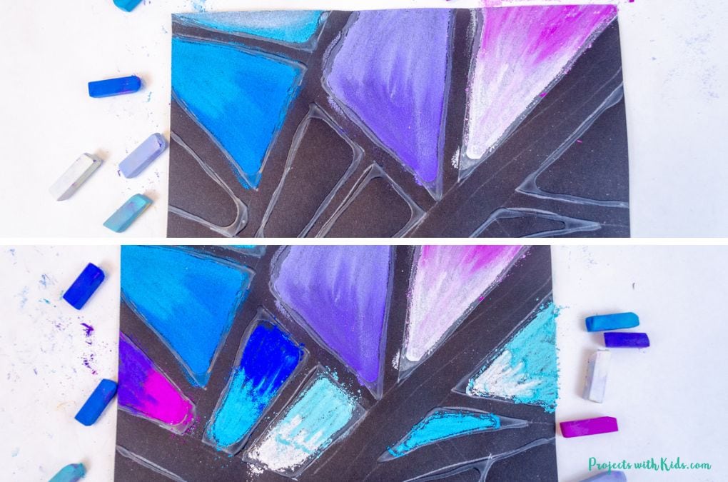 Close up photos of blues and purples chalk pastels on black paper.