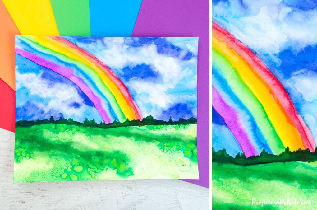 Rainbow art project idea for kids to make with watercolor paint.