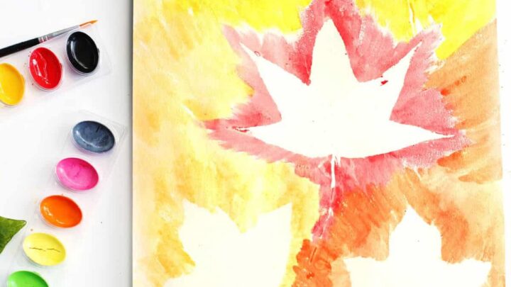 Fall leaf art project using real leaves and watercolor paint.